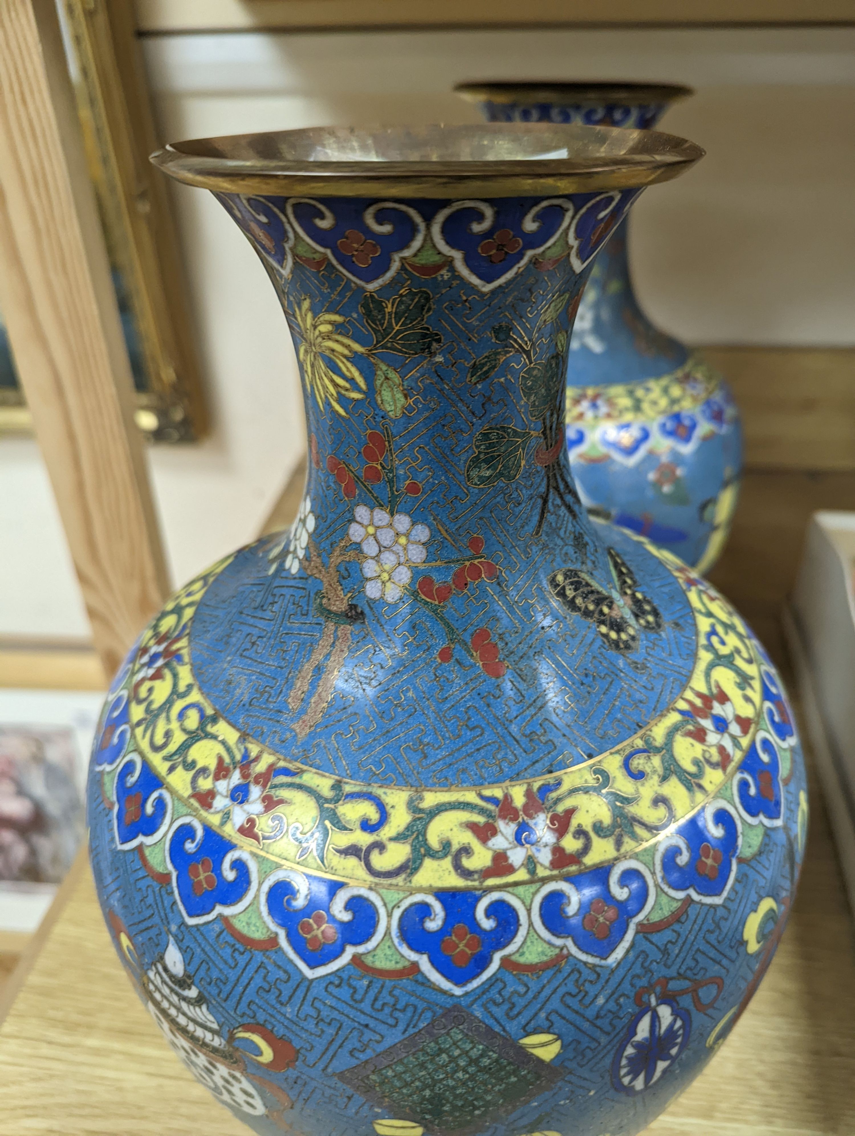 A pair of late 19th/early 20th century Chinese cloisonné enamel ‘Buddhist emblems’ vases 36cm
